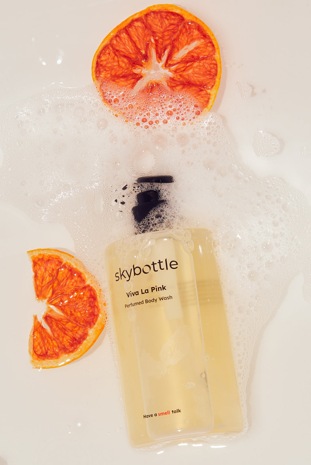 Skybottle Perfumed Body Wash Viva La Vida 300ml bottle with oranges in background