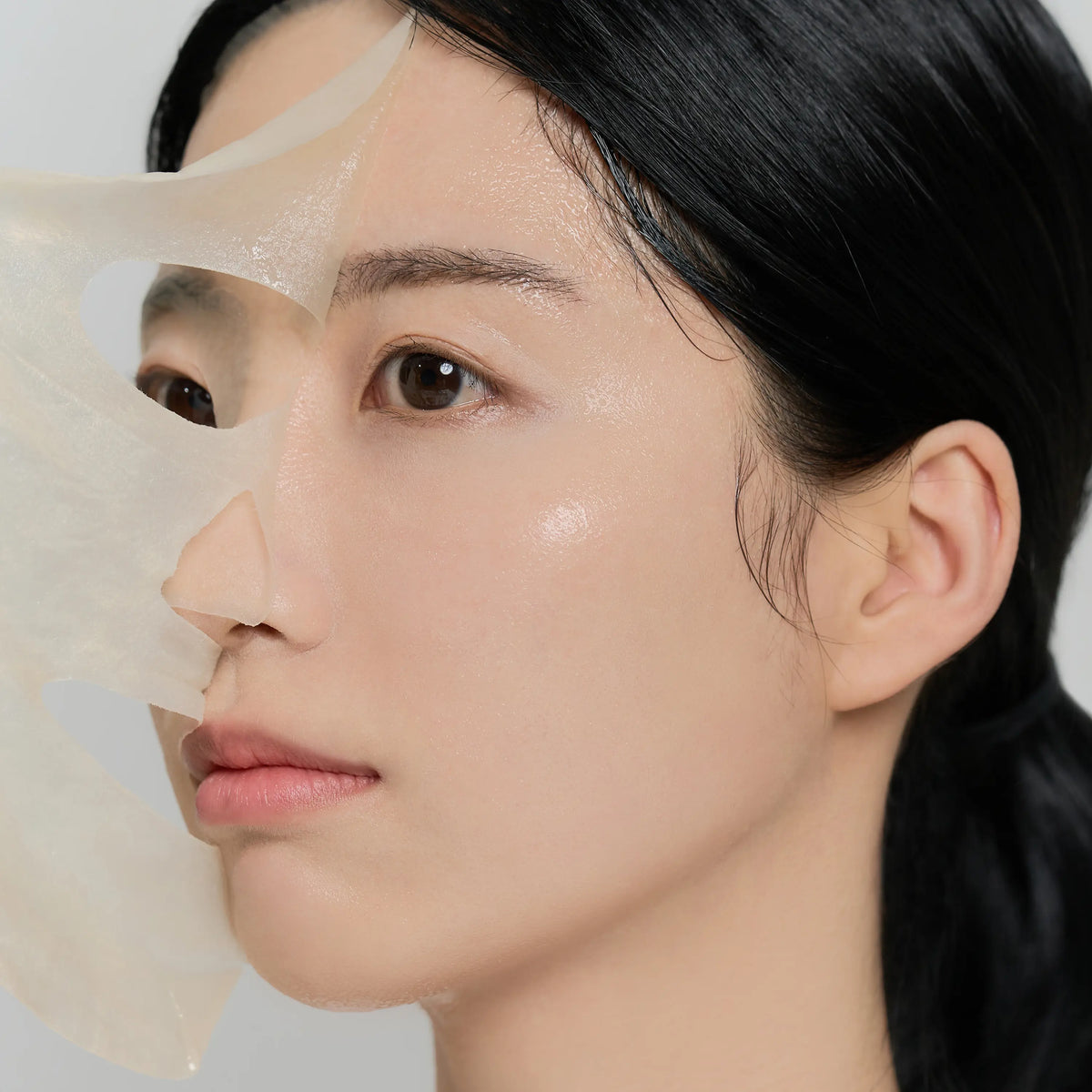 Applying SKIN1004 Watergel Sheet Ampoule Mask for fresh hydrated and glowing skin