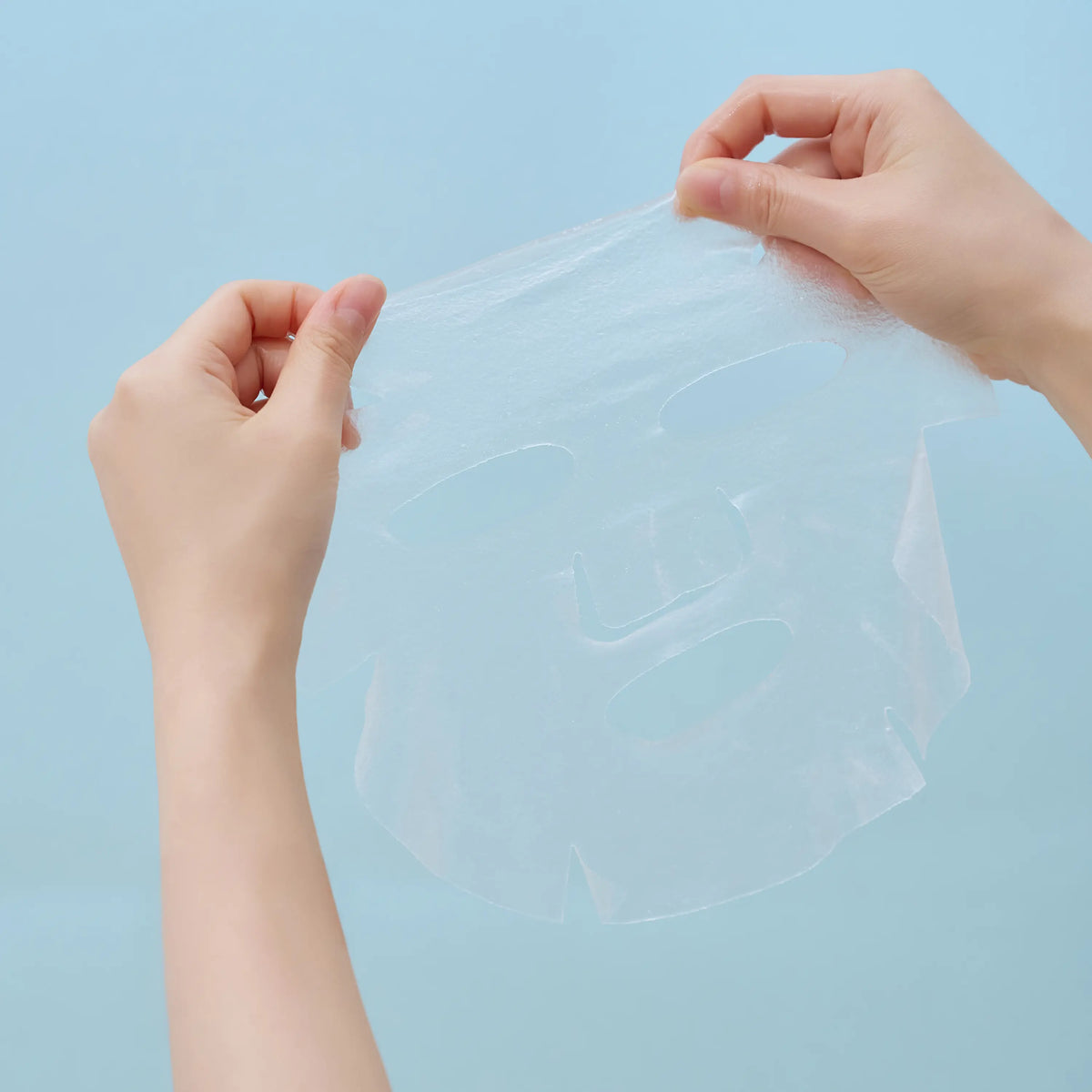 Applying SKIN1004 Hyalu-Cica Hydrating sheet mask to deeply hydrate and soothe dry skin