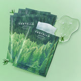 Applying SKIN1004 Tea-Trica Relaxing sheet mask to calm irritated and acne-prone skin