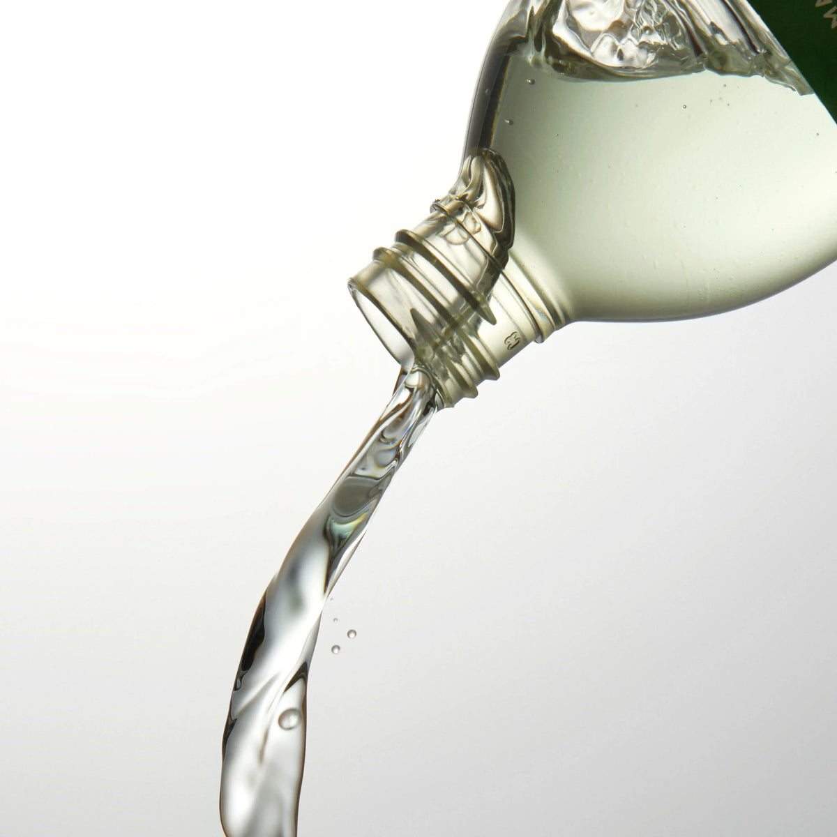 Aromatica Rosemary Root Enhancer product pouring from bottle