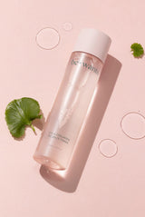 Bewants Cica Collagen Essence Toner bottle laying on pink background