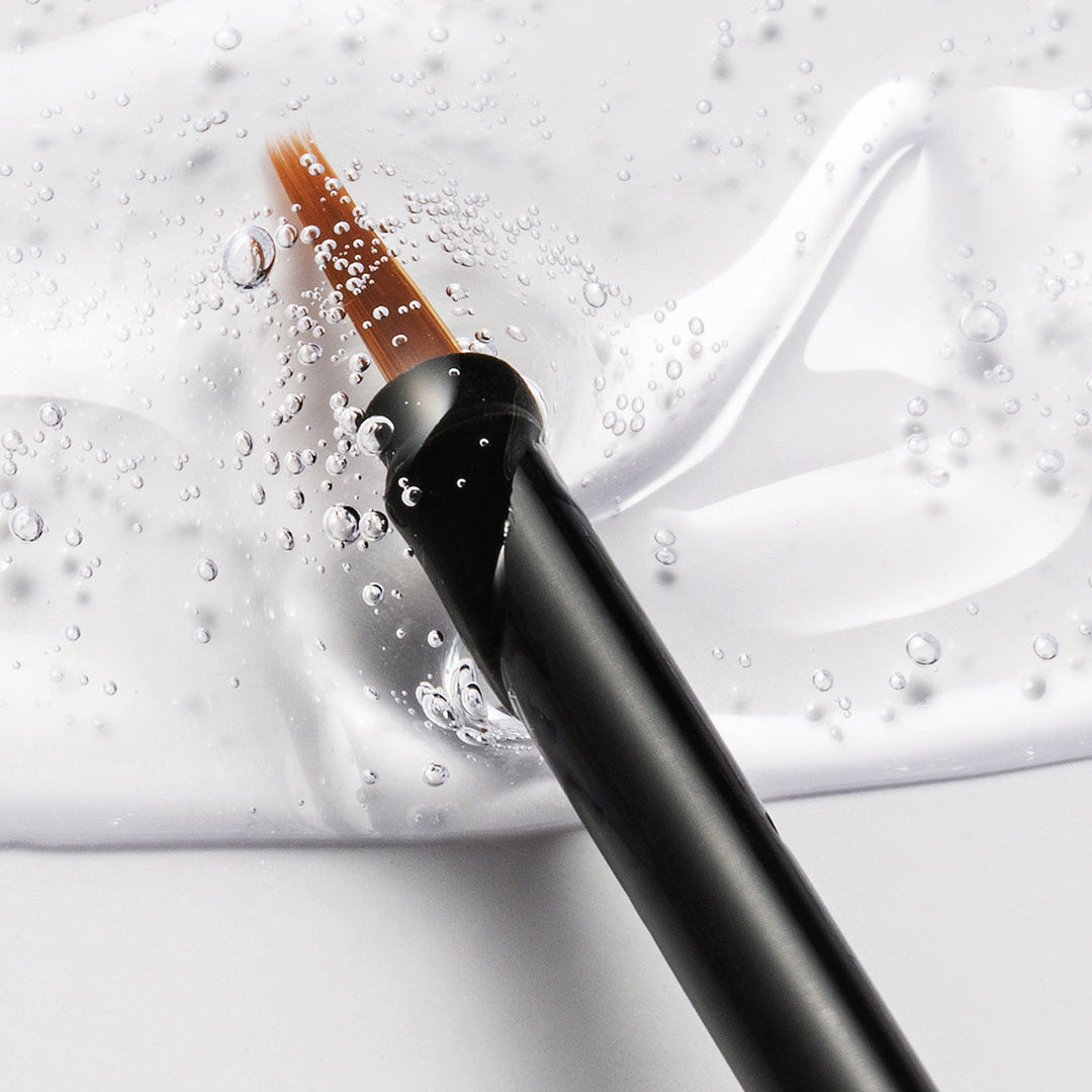 Cosnori Eyelash Serum 100 EX brush applicator texture close-up