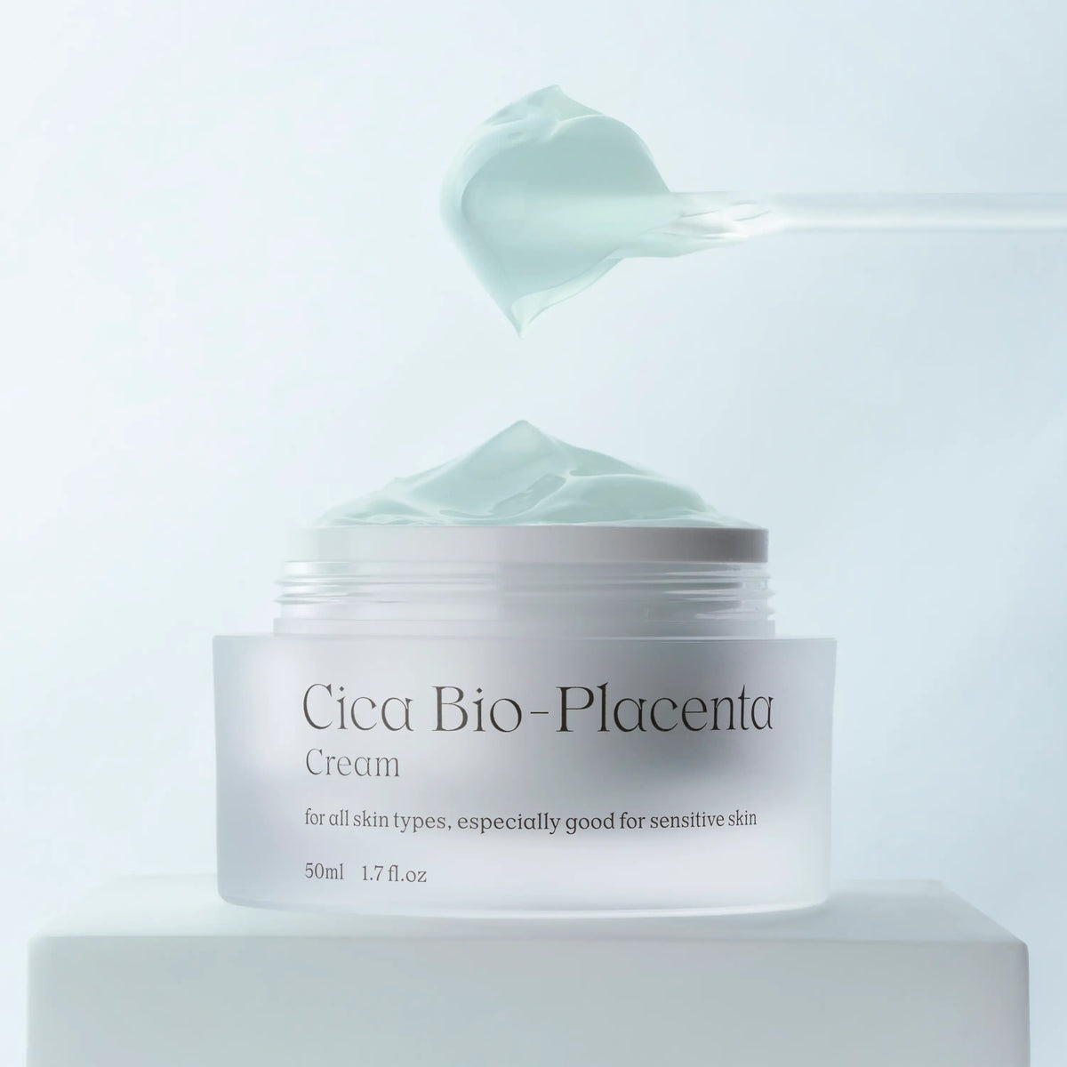 Scooping NDP Cica Bio-Placenta Cream to calm redness and support skin barrier repair