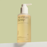 NDP Moringa Hemp pH Balancing Gel Cleanser 200ml bottle on a green background