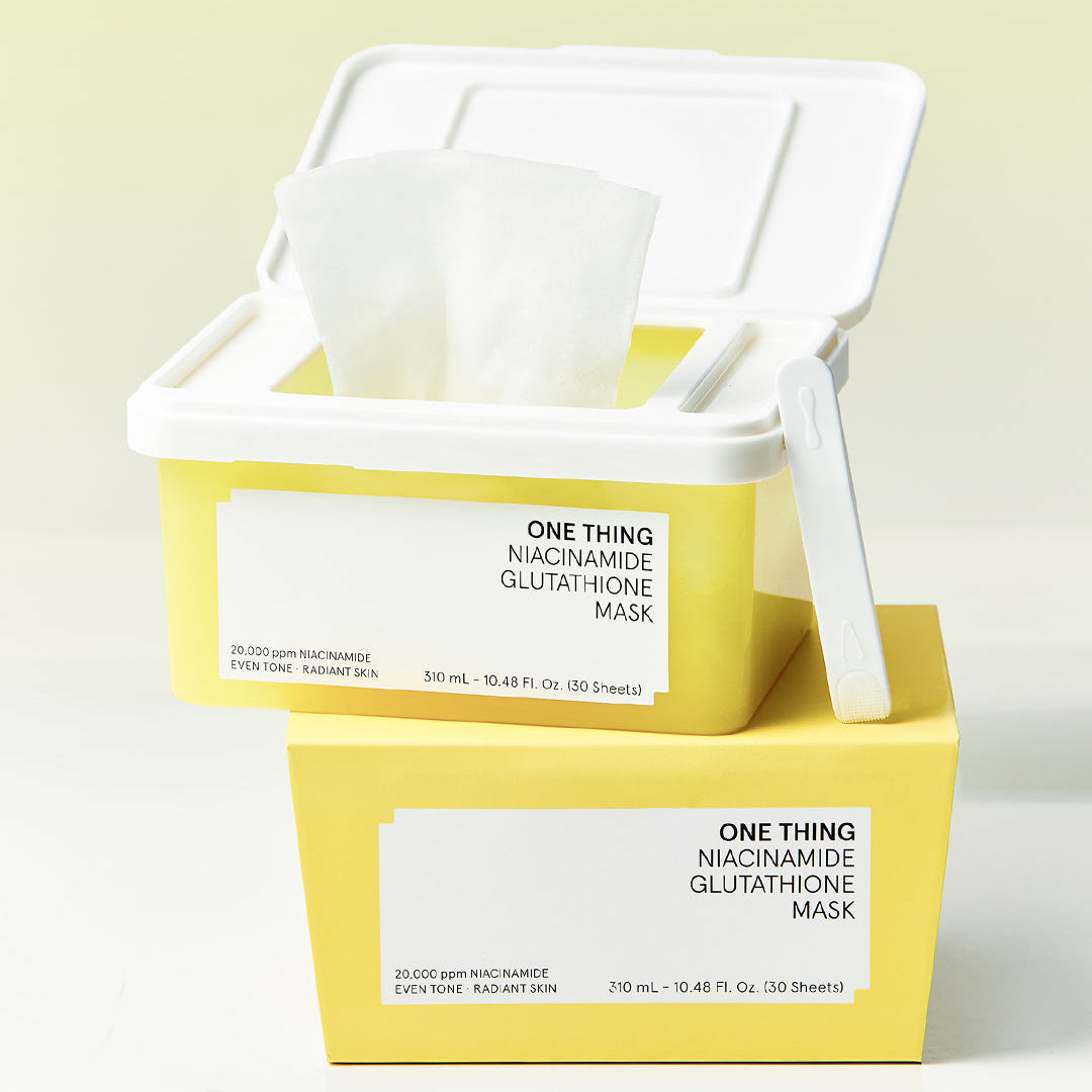 One Thing Niacinamide Glutathione Mask sheet being pulled from container with packaging