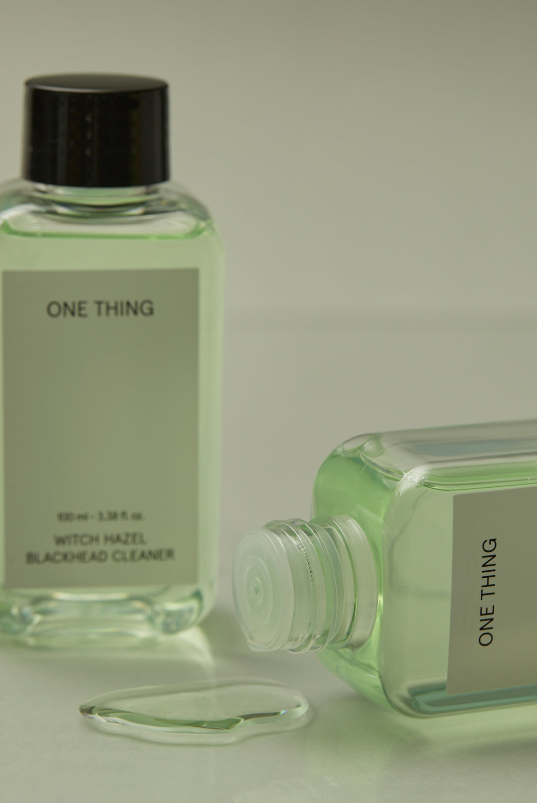 One Thing Witch Hazel Blackhead Cleaner Set Nose Pack Pad pore treatment liquid dripping from bottle