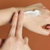 SKIN1004 Madagascar Centella Probio-Cica Enrich Cream applied on back of hand