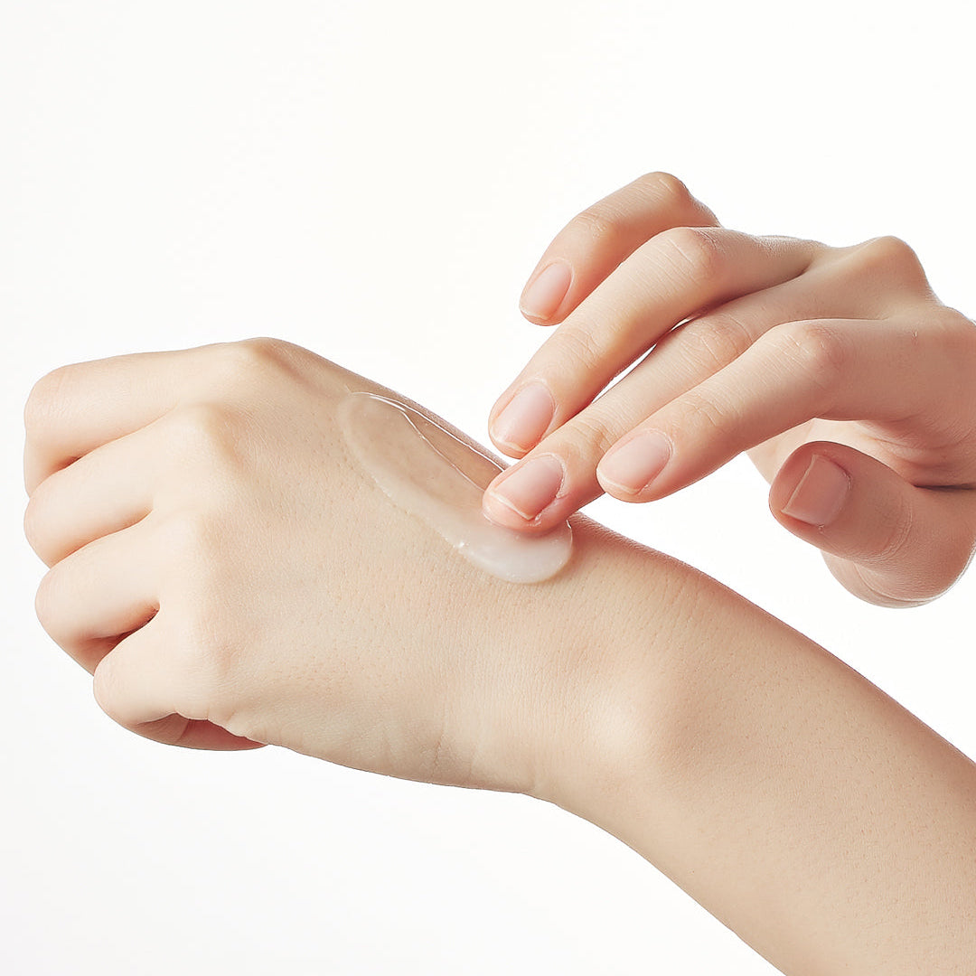 SKIN1004 Madagascar Centella Hyalu-Cica Blue Serum being dispensed onto hand