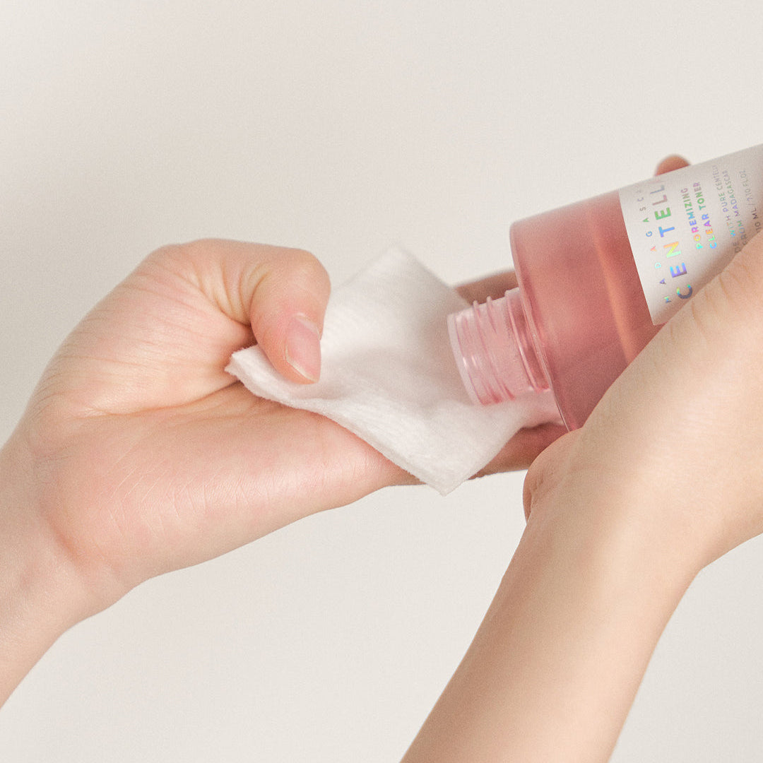 SKIN1004 Madagascar Centella Poremizing Clear Toner being poured onto cotton pad