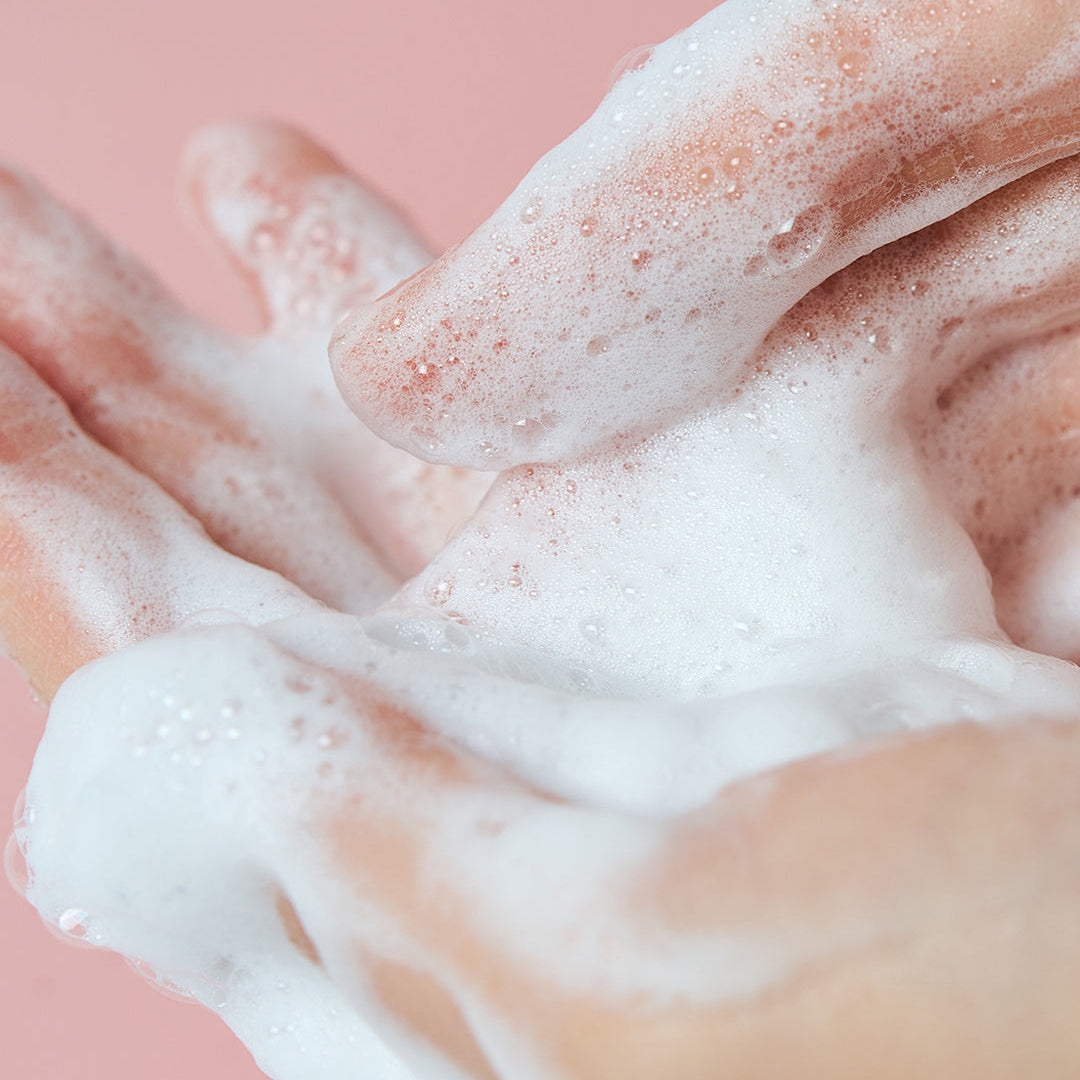 SKIN1004 Madagascar Centella Poremizing Deep Cleansing Foam lathered on hands