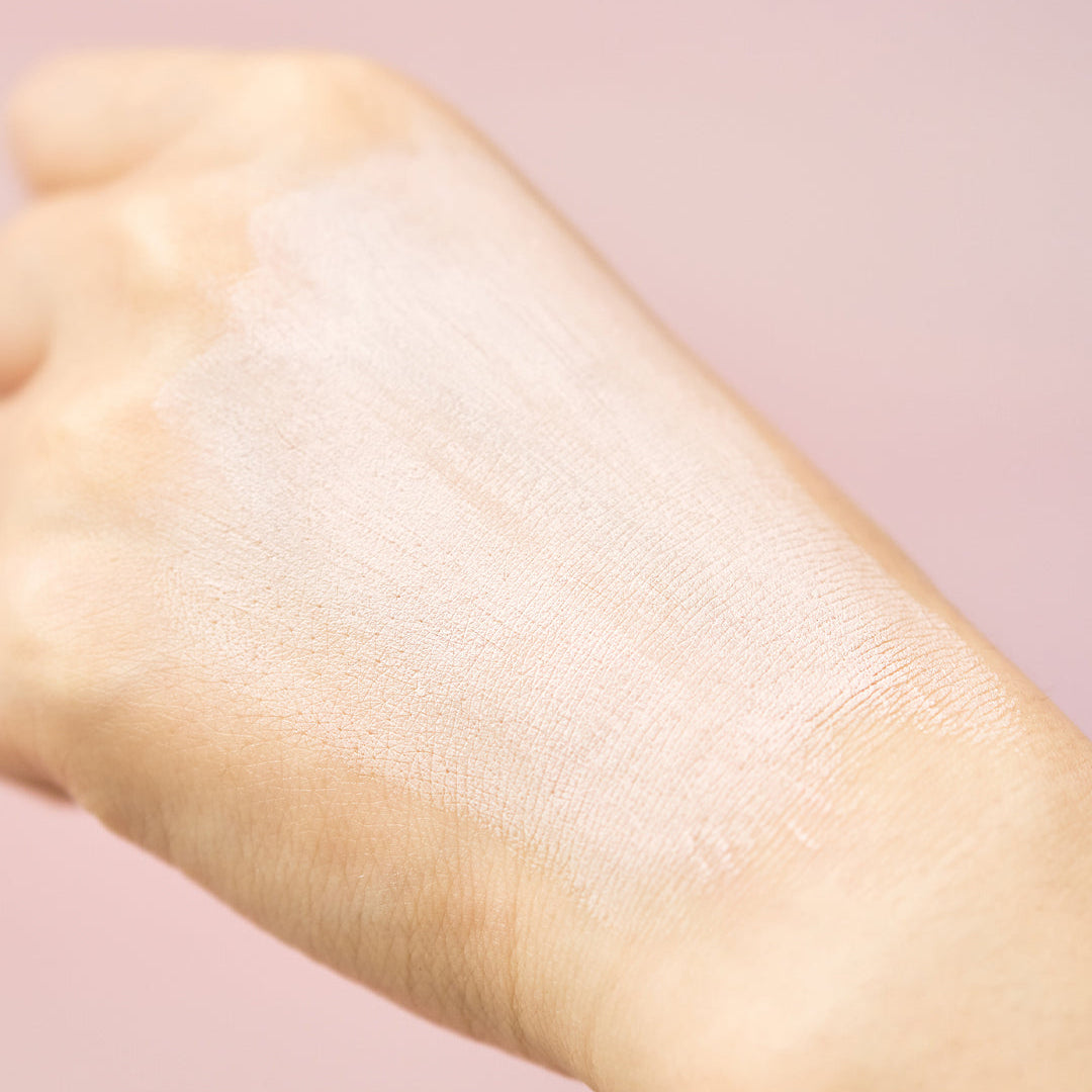SKIN1004 Madagascar Centella Poremizing Quick Clay Stick Mask absorbed on back of hand