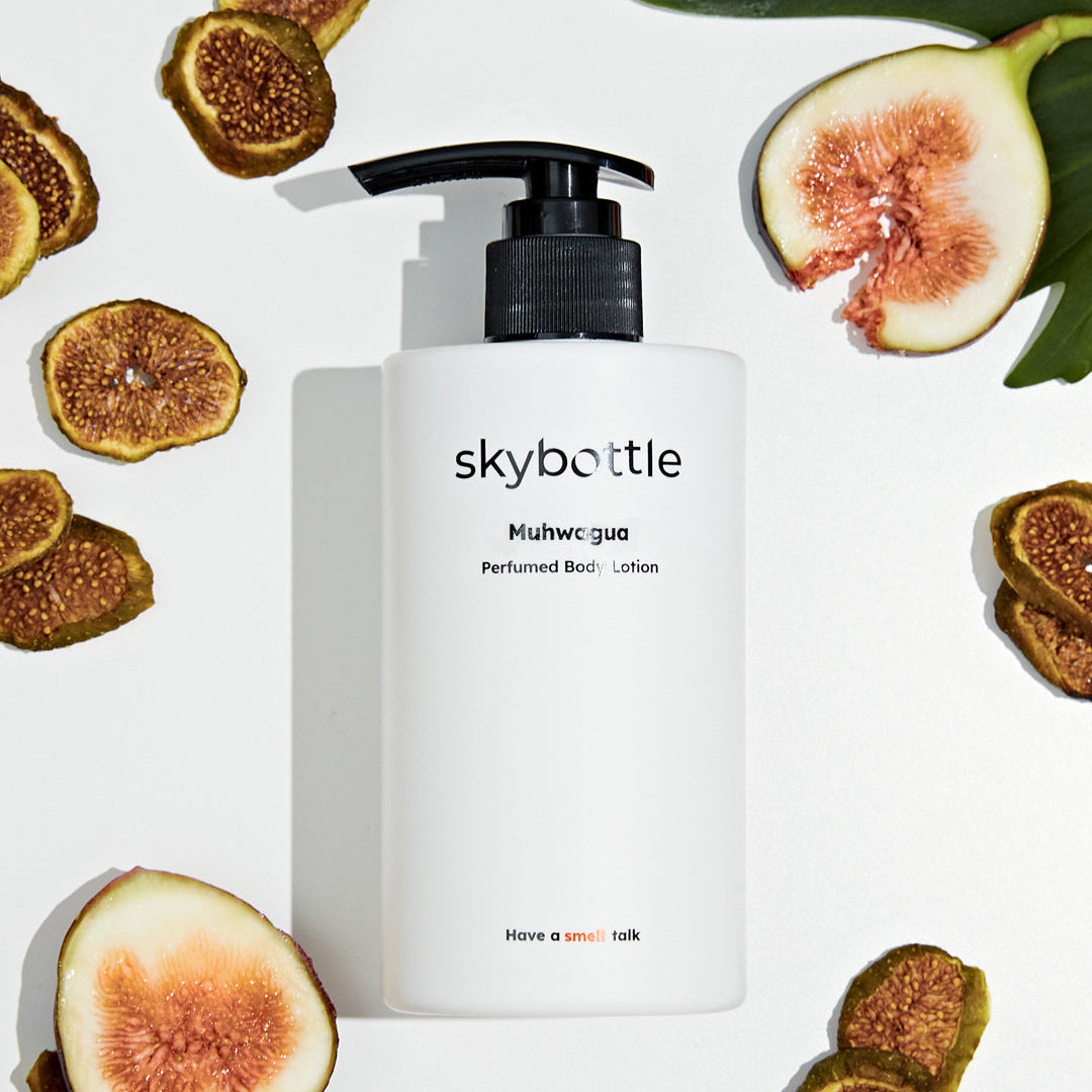 Skybottle Perfumed Body Lotion Muhwagua 300ml bottle with fresh figs in background