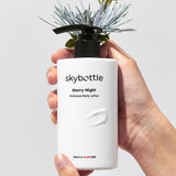 Skybottle Perfumed Body Lotion Starry Night 300ml held in hand with flowers