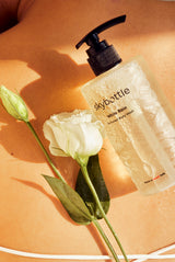 Skybottle Perfumed Body Wash White Rain 300ml bottle with white roses in background