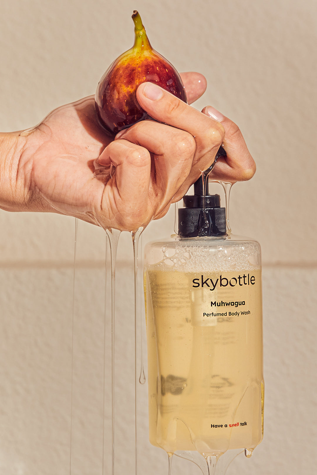 Skybottle Perfumed Body Wash Muhwagua 300ml bottle with fresh figs in background