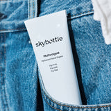 Skybottle Perfumed Hand Cream Muhwagua 50ml tube in jeans pocket