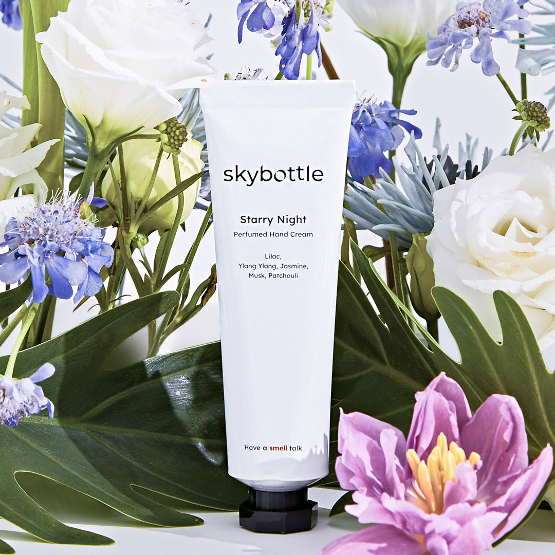 Skybottle Perfumed Hand Cream Starry Night 50ml with flowers in background