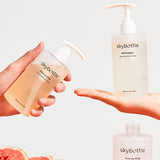 Skybottle Perfumed Hand Wash collection three bottles with fresh grapefruit and figs in background