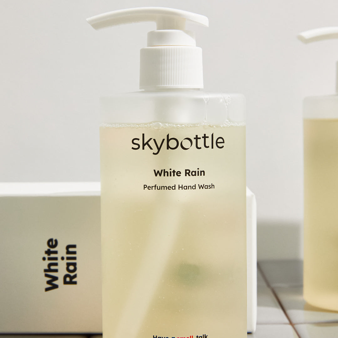 Skybottle Perfumed Hand Wash White Rain 300ml bottle on tile surface