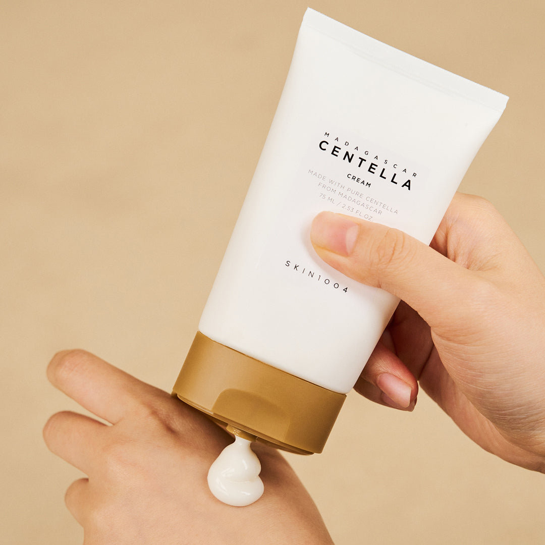 SKIN1004 Madagascar Centella Cream being squeezed onto hand